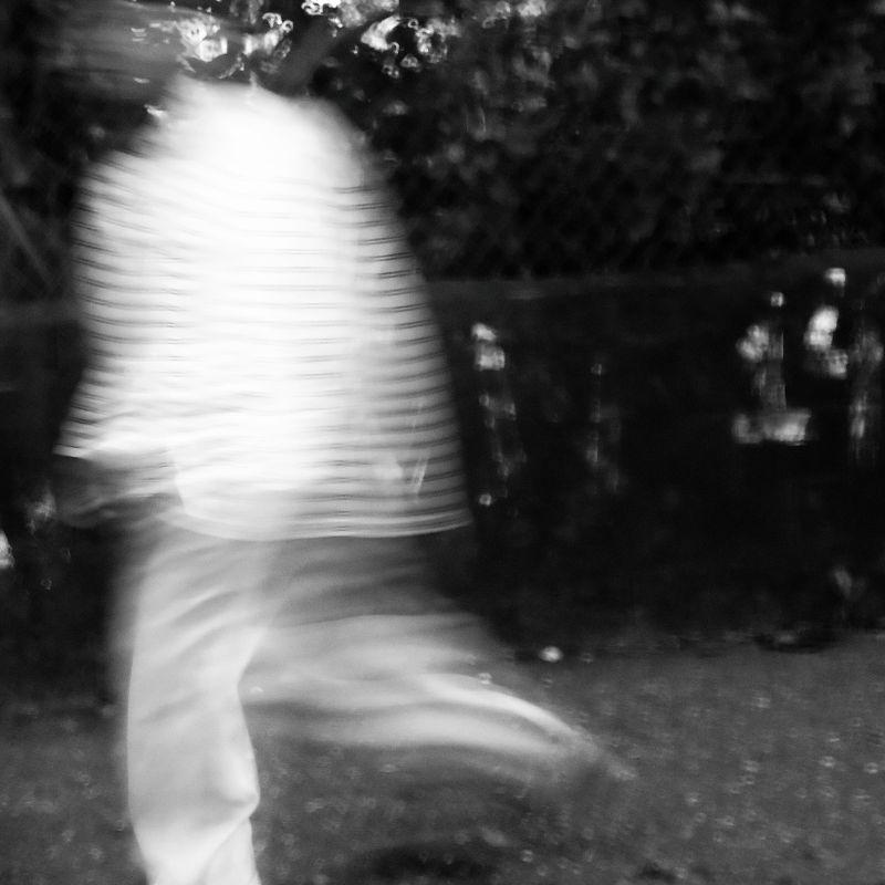 a-picture-of-a-ghost-walking-through-a-yard a-picture-of-a-ghost-walking-through-a-yard